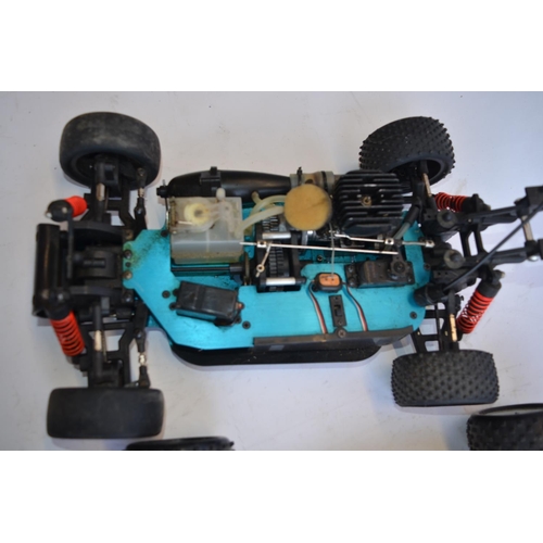 317 - 3 1/10 scale nitro radio control off road car chassis, 1 SMT (4WD), 1 Traxxus (2WD), 1 FP'S Pizazz-B... 