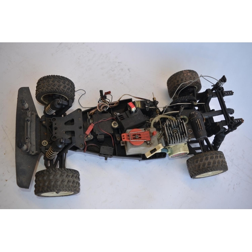 318 - Kyosho Sandmaster rc nitro car, a Kyosho nitro road car chassis, a Kyosho nitro off road buggy chass... 