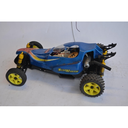 318 - Kyosho Sandmaster rc nitro car, a Kyosho nitro road car chassis, a Kyosho nitro off road buggy chass... 