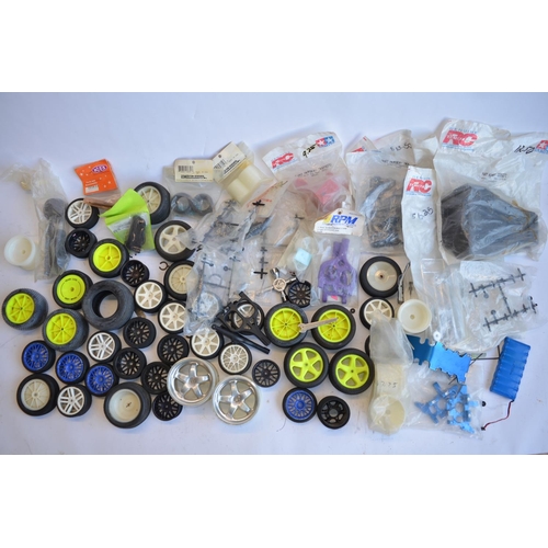 320 - Large collection of spare parts for radio control cars, from a wide variety of manufacturers includi... 