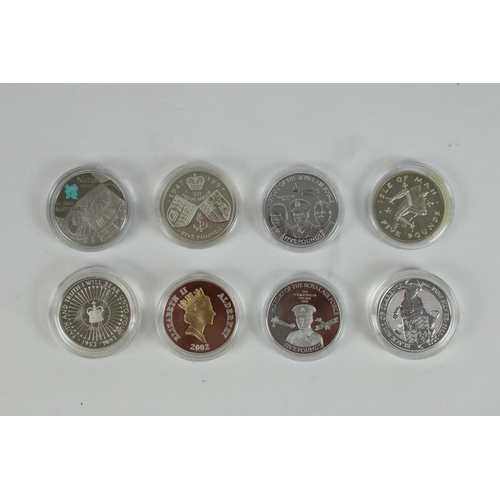 681 - Eight commemorative UK, Channel Islands and IOM £5 coins, some likely silver proofs but no certs, in... 