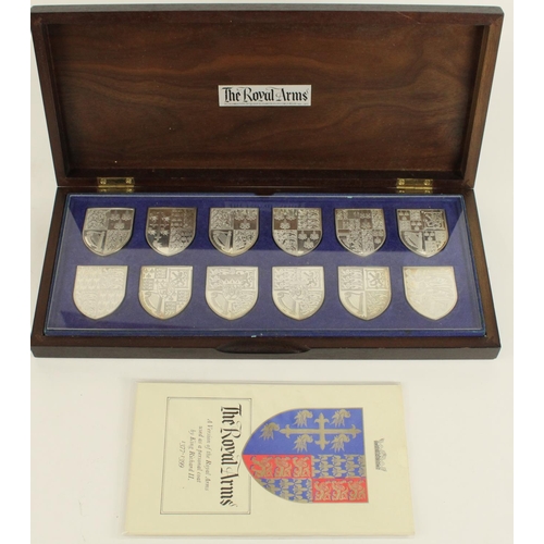 689 - The Royal Arms hallmarked sterling silver shield medallion collection as produced for the ERII 1977 ... 