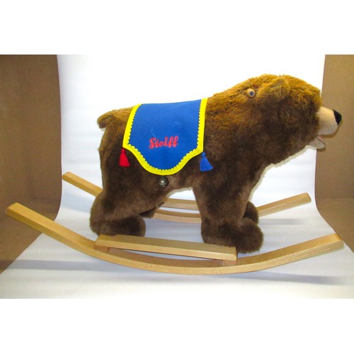 195A - Steiff bear rocker, in brown plush with blue Steiff sash, L106cm H63cm