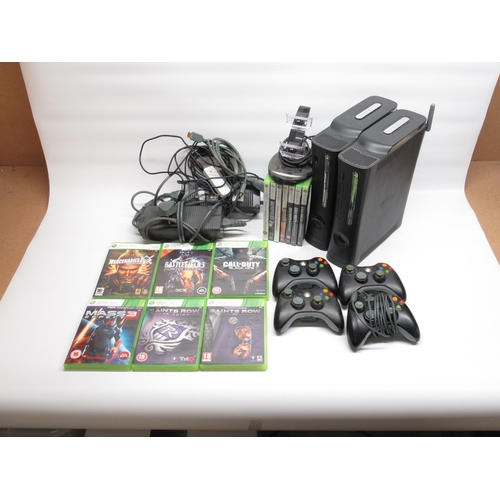 1443 - 2 Xbox 360 consoles, 3 controllers, controller charge station and 13 games