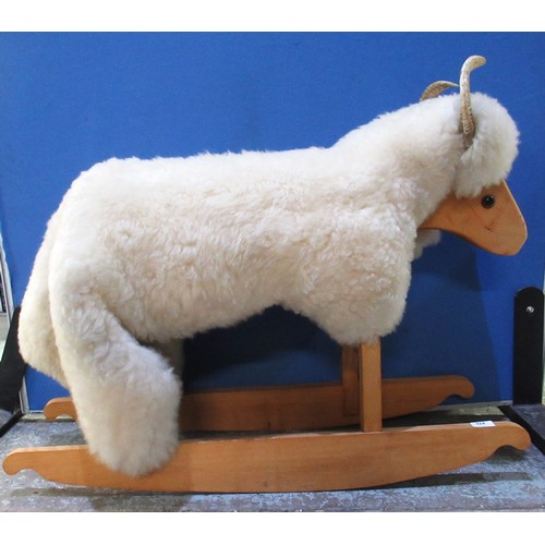 324 - Pine framed rocking sheep with detachable sheep skin cover, L95cm H74cm