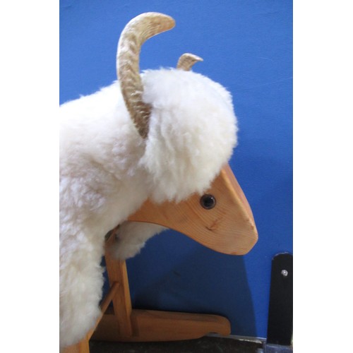 324 - Pine framed rocking sheep with detachable sheep skin cover, L95cm H74cm