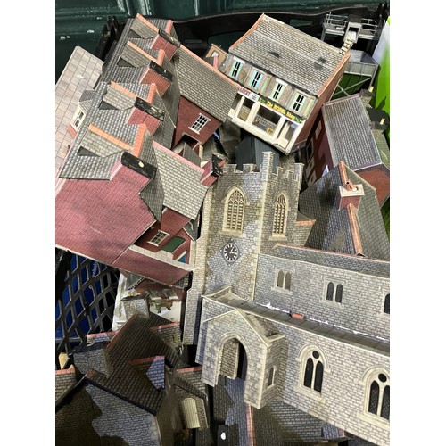 92 - Large collection of model railway scenery of buildings, churches, etc