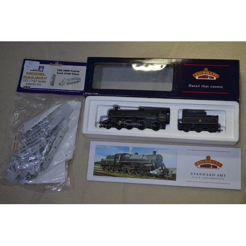 95 - Boxed as new Bachmann branch line, standard 4MT 75059 BR line, black E crest and BR 2 tender, with g... 