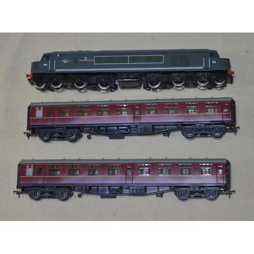 102 - OO gauge Mainline D48 diesel train with Manchester Regiment logo and two passenger carriages