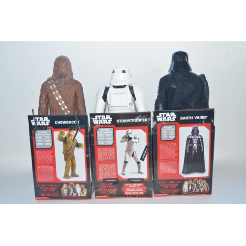 265 - Collection of Star Wars toys including 3 large Star Wars action figures by Disney (Chewie, A Stormtr... 