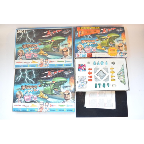 271 - Collection of Thunderbirds models, figures and games including a Corgi Miss Penelope's FAB 1, an uno... 