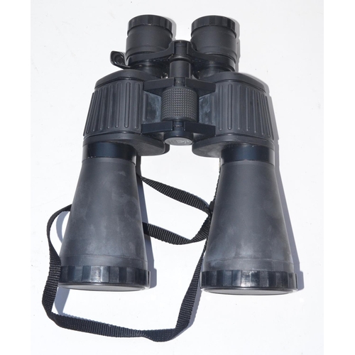 133 - Pair of 15x60x63 GKE (Japan) binoculars with padded carry bag.