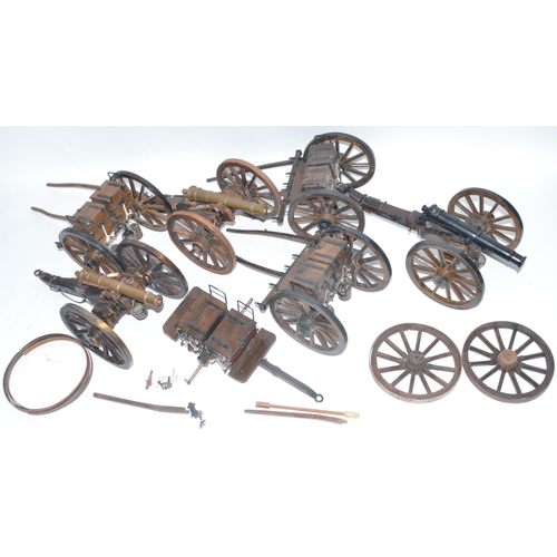 141 - Three large cannon models in metal and wood with ammunition tenders and some spare wheel rims. Appro... 