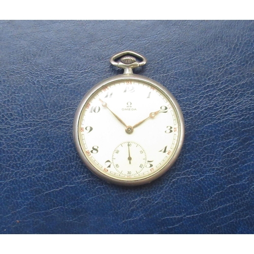 963 - Omega pocket watch in steel case, with hand winder and second hand movement, inscription 'To Father ... 