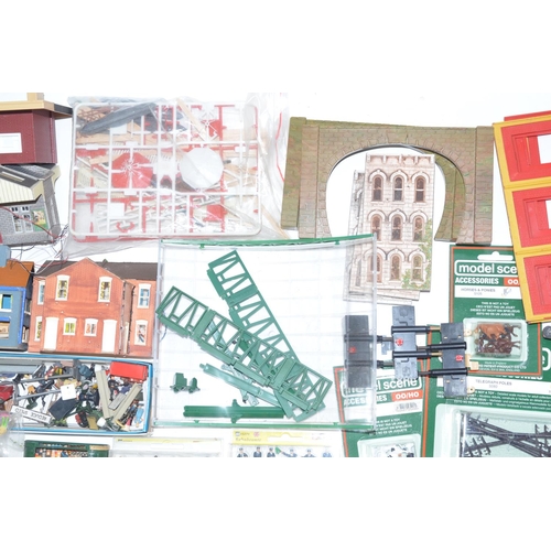 159 - Collection of OO gauge scenic and track accessories including buildings, bridges, tunnel entrances, ... 