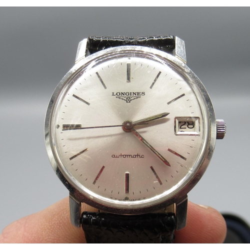 107 - Longines automatic wristwatch with date. silvered dial with applied baton hour markers, outer minute... 