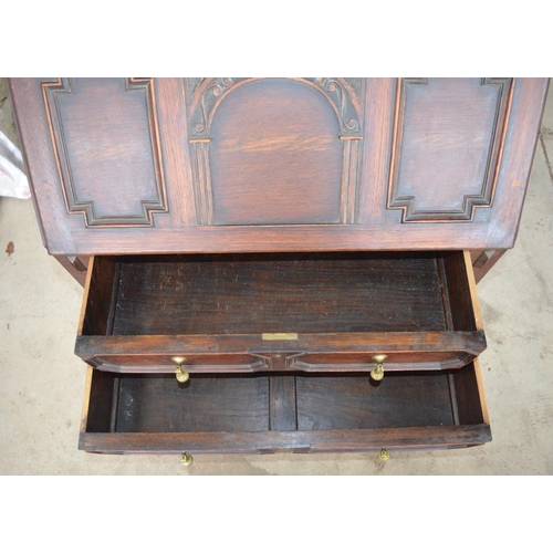230 - C20th oak bureau, fall front above two drawers on turned supports with stretchers W73 D45 H96