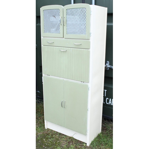 244 - Vintage green and white painted kitchen cabinet, with two glazed doors, a drawer and fall above two ... 