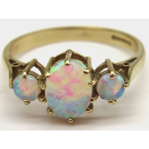 2 - 9ct yellow gold ring set with three opals, stamped 375, size P, 2.2g