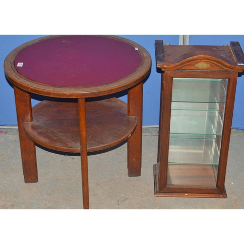 127 - Mid C20th circular oak table by W.T Nicholls Ltd with under tier and inset red leatherette top, stam... 