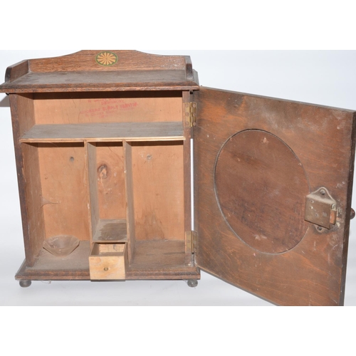 215 - Geo.Phone Inductor type speaker in Art Deco walnut case, an oak cabinet with mirror panel door (2)