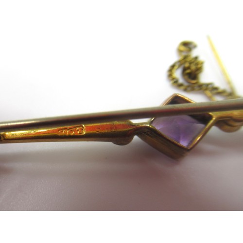 186 - 9ct gold hallmarked amethyst set bar brooch, a similar bar brooch stamped 9ct, and an unmarked bar b... 