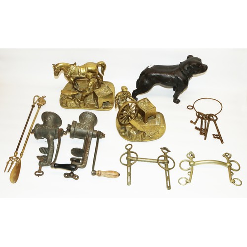 113 - Brass model of a farrier, brass model of a blacksmith, two equestrian driving bits, two British-made... 