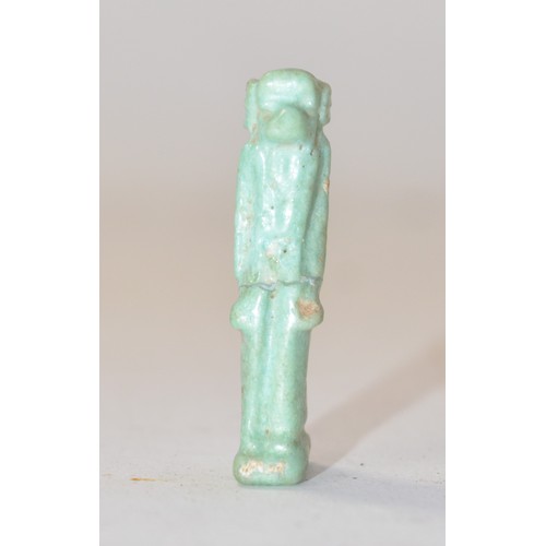 147 - Possible antiquity, cream glazed ceramic amulet, possibly of Egyptian deity, H3.6cm (A/F - split in ... 