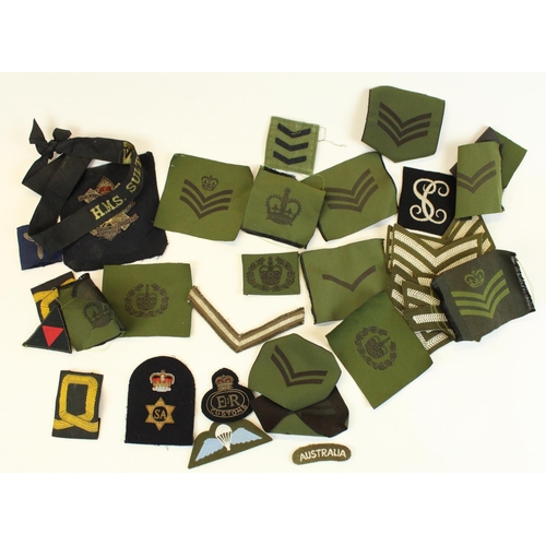 23 - Large collection of cloth insignia badges, including HMS Sultan cap silk, sergeant stripes, paratroo... 