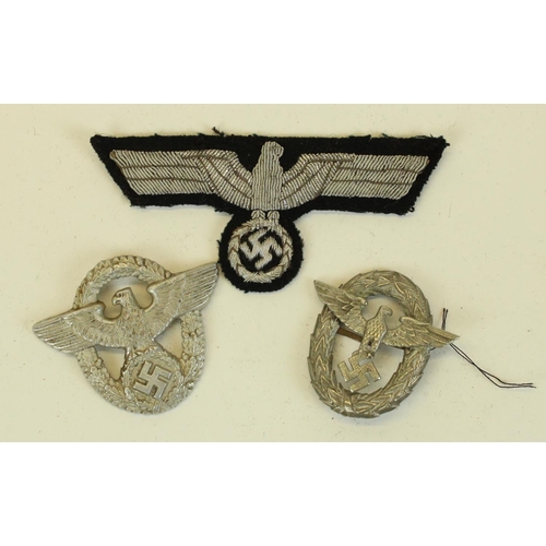 63 - German Third Reich WWII era silver bullion eagle patch and two similar metal cap badges