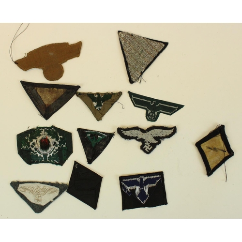 77 - Selection of German Third Reich cloth badges and patches to include Luftwaffe eagle badge, NSKK Moto... 