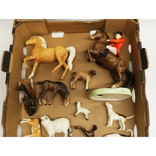 535 - Collection of Beswick animals including huntsman on rearing horse, hounds, fox, foals, etc., most AF... 