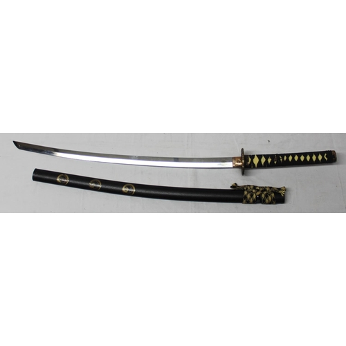 122 - Quality reproduction katana in scabbard, blade L27.5