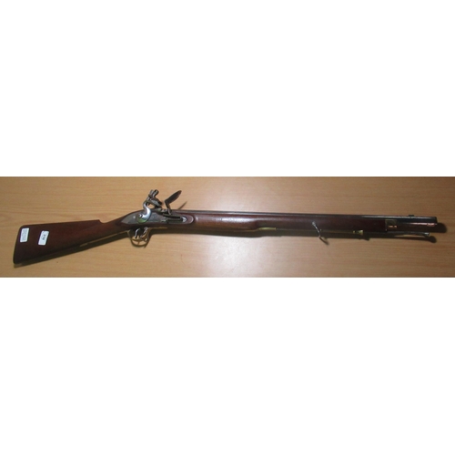 878 - Black powder flintlock carbine, with brass mounts, 25