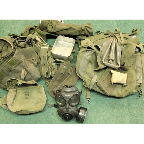 125 - Selection of c1970s British Army webbing and accessories to include Mess tins, water bottles, foldin... 