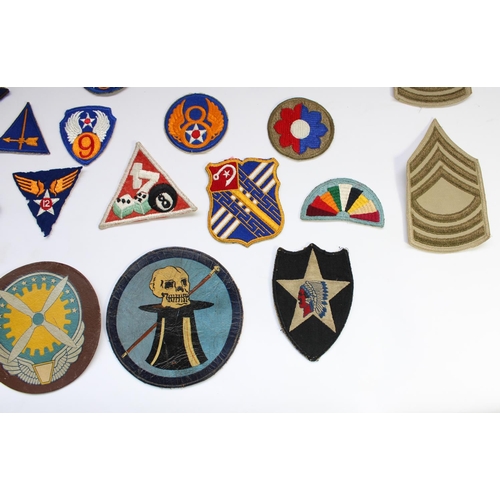 208 - Collection of US military regimental and squadron cloth badges and patches, mainly WW2 era including... 