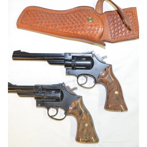 803 - Two Crossman CO2 powered .177 revolver air pistols, a long barrelled Model 38T, SN 378207393 (leaks ... 