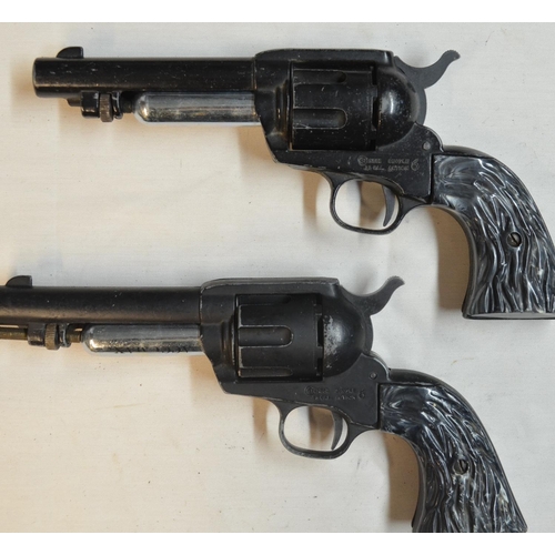 807 - Two Crossman .22 single action CO2 powered air pistols, all metal body with faux horn grips. Conditi... 