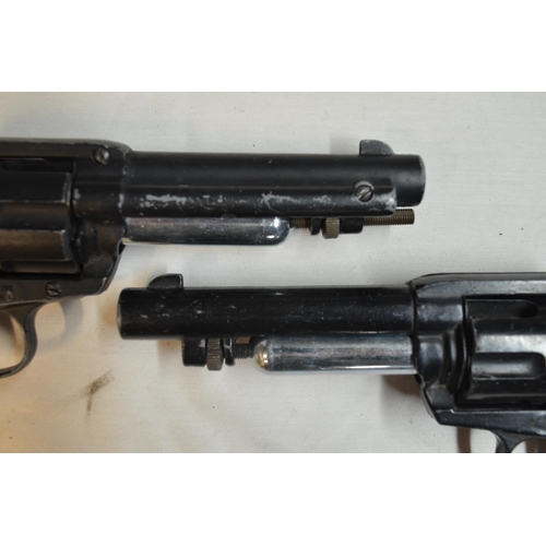 807 - Two Crossman .22 single action CO2 powered air pistols, all metal body with faux horn grips. Conditi... 