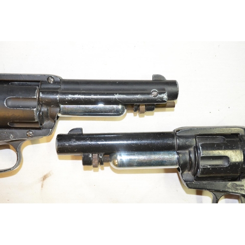 807 - Two Crossman .22 single action CO2 powered air pistols, all metal body with faux horn grips. Conditi... 