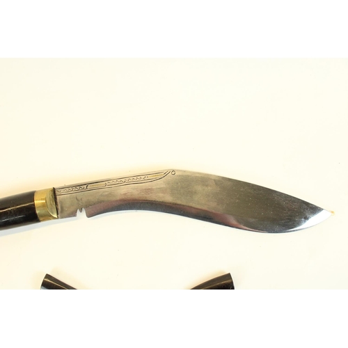 107 - Nepalese Kukri in decorative silvered metal sheath with Karda and Chakmak