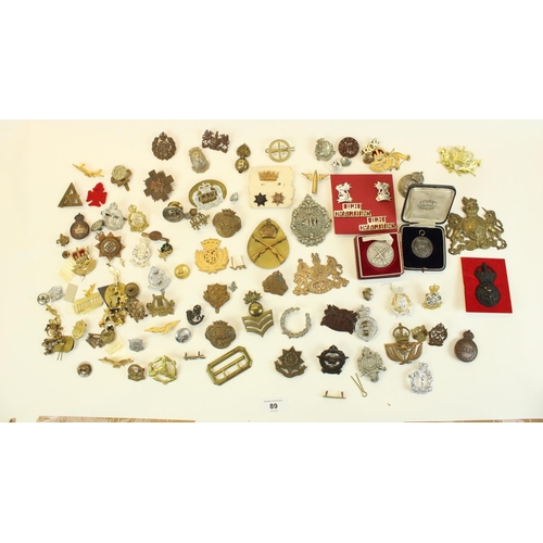 89 - Large collection of military cap badges, lapel badges, buttons etc. highlights boxed 14th West Yorks... 