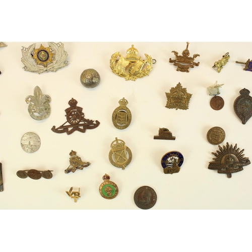 91 - Collection of British military and other badges, emblems etc. highlights Womens Land Army, Royal Ars... 