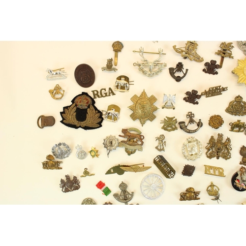 92 - Selection of British military cap badges, emblems etc with some world and civilian, examples inc. ea... 