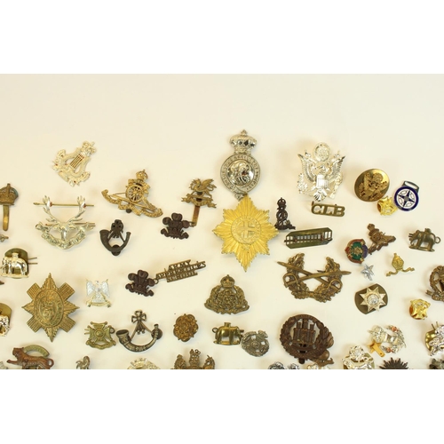 92 - Selection of British military cap badges, emblems etc with some world and civilian, examples inc. ea... 