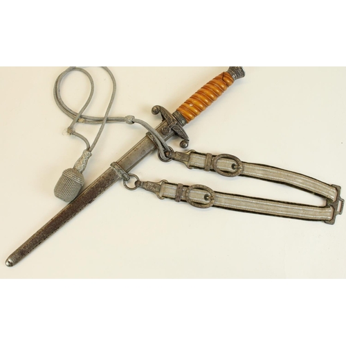 93 - WWII German Third Reich Kreigsmarine dagger with orange ribbed hilt and textured scabbard and attach... 