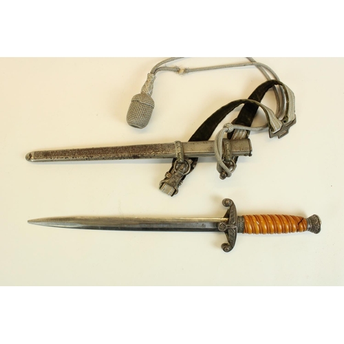 93 - WWII German Third Reich Kreigsmarine dagger with orange ribbed hilt and textured scabbard and attach... 