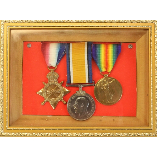 182 - WWI medal trio for 208251 Able WA Byles, Royal Navy.  Framed and glazed