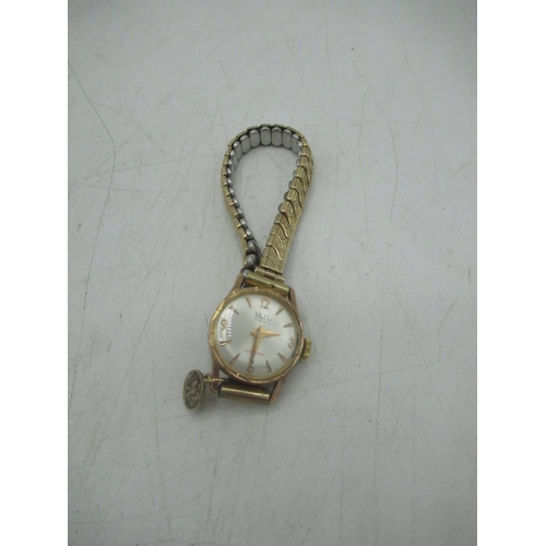 1202 - Ladies Mudu Ferrotex hand wound wristwatch, signed silvered Arabic dial with gold coloured baton hou... 