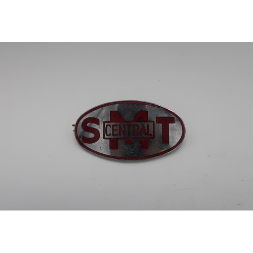 1207 - Central SMT oval enamel cap badge